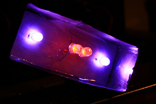 Small case with LEDs which provide backlightning to the emblem.
