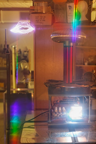 Click for a high-resolution version. Tesla coil lightnings trough diffraction grating
